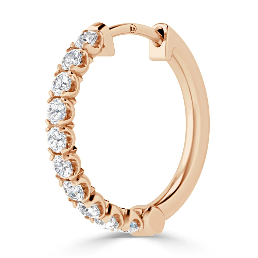 Rose gold hoop earring adorned with a row of round, sparkling white diamonds on the outer edge.