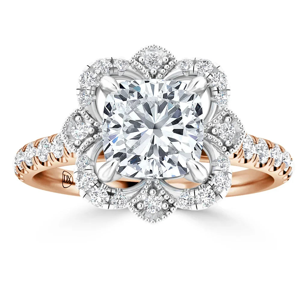 Rose gold ring with a large square diamond, floral diamond halo, and diamond band on white background.