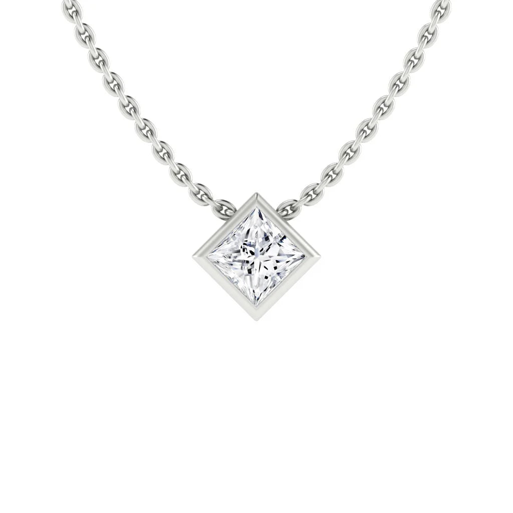 Silver chain necklace with a square diamond pendant set in a simple bezel on a white background.