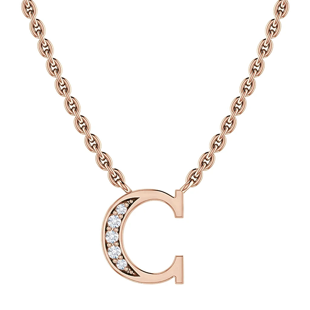 Rose gold chain necklace with a C pendant, featuring embedded small sparkling diamonds on one side.