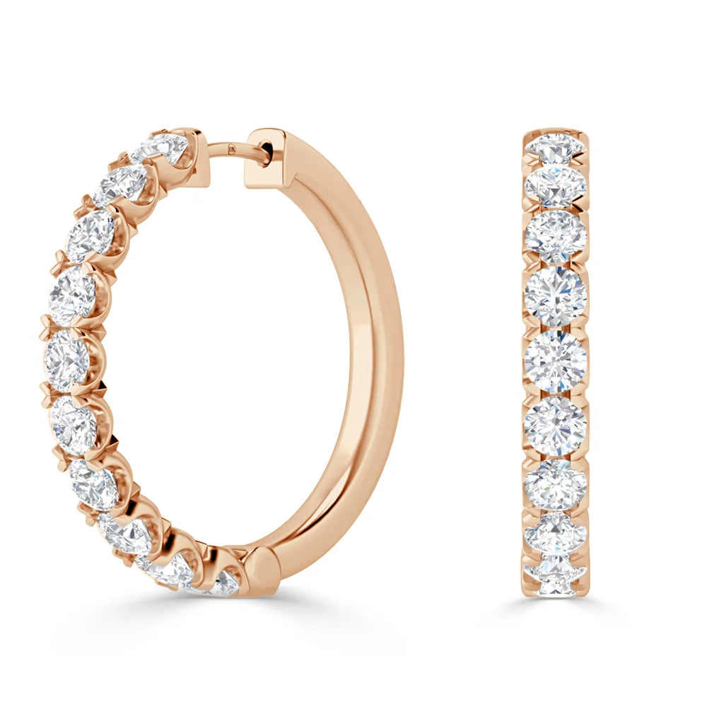 Rose gold hoop earrings with round, prong-set diamonds covering the front half, shown from two angles.