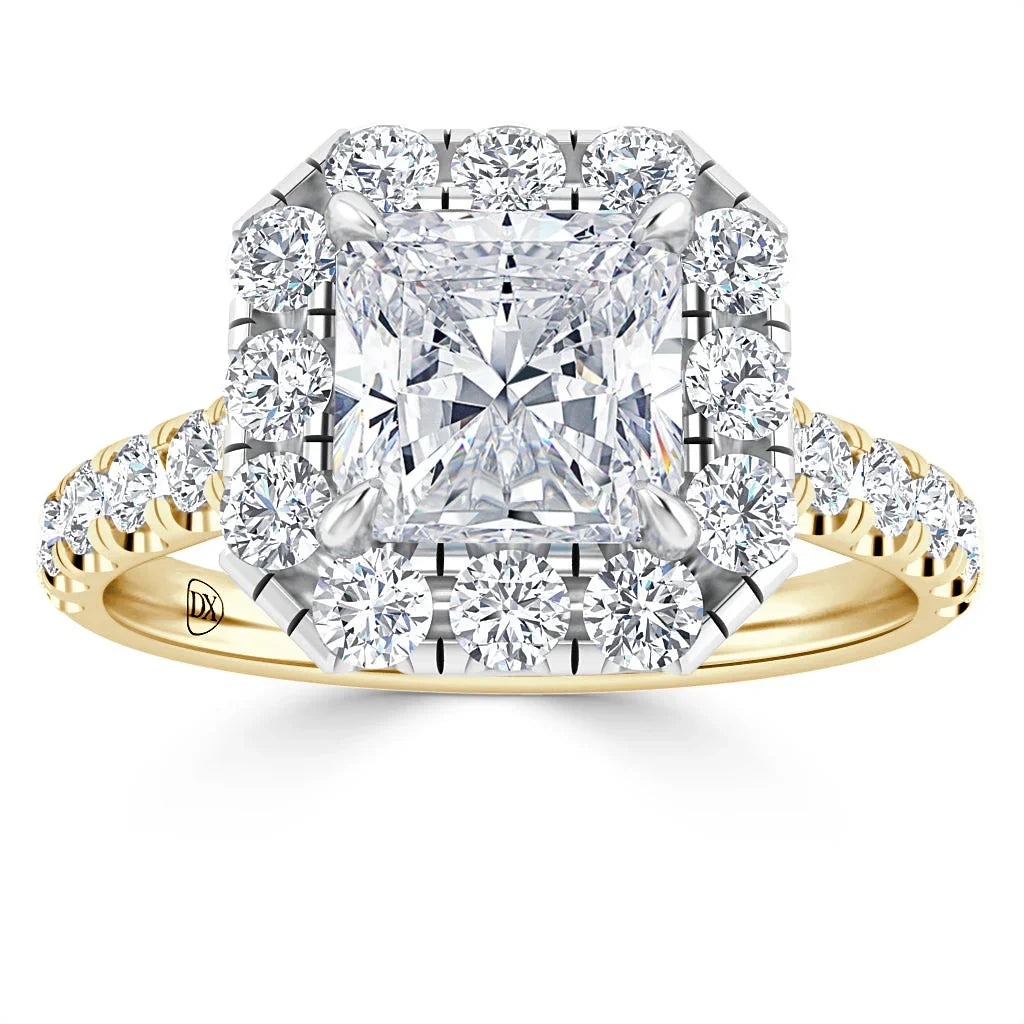 Gold ring with a large princess-cut diamond center, surrounded by a halo of round diamonds and diamond-studded band.