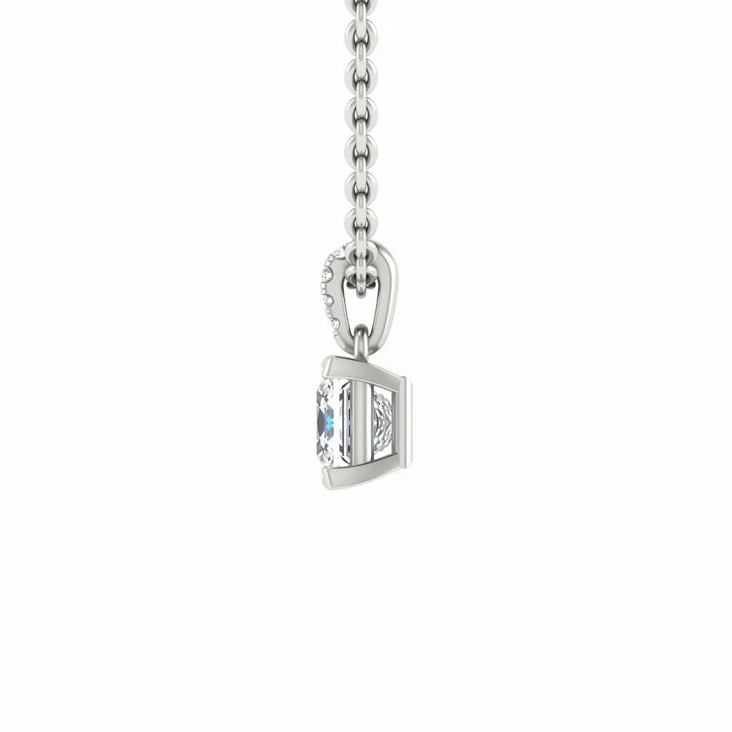 Side view of a silver chain necklace with a rectangular gemstone pendant in a minimalist setting.