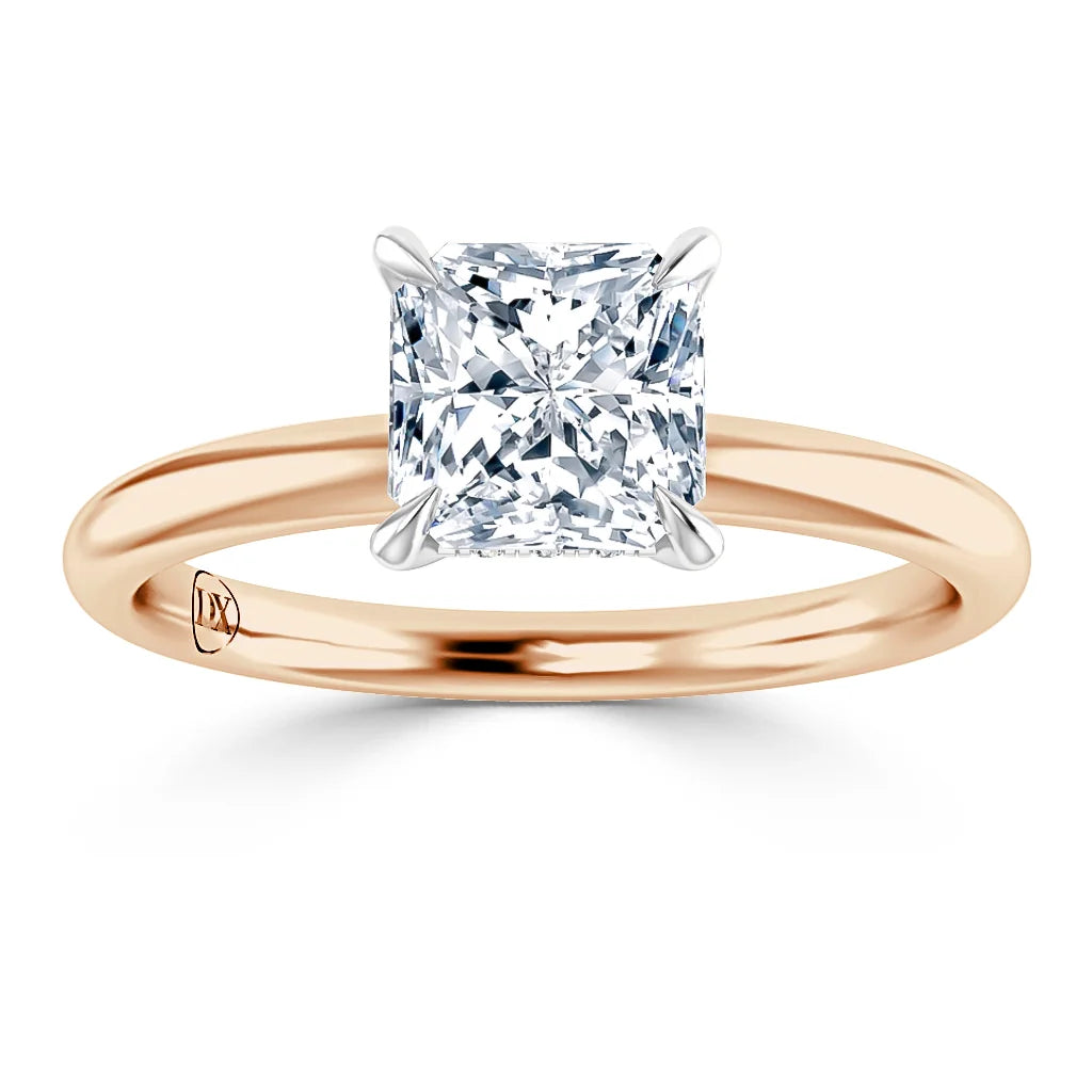 A solitaire princess-cut diamond ring with a rose gold band and four prong setting, viewed from the front.