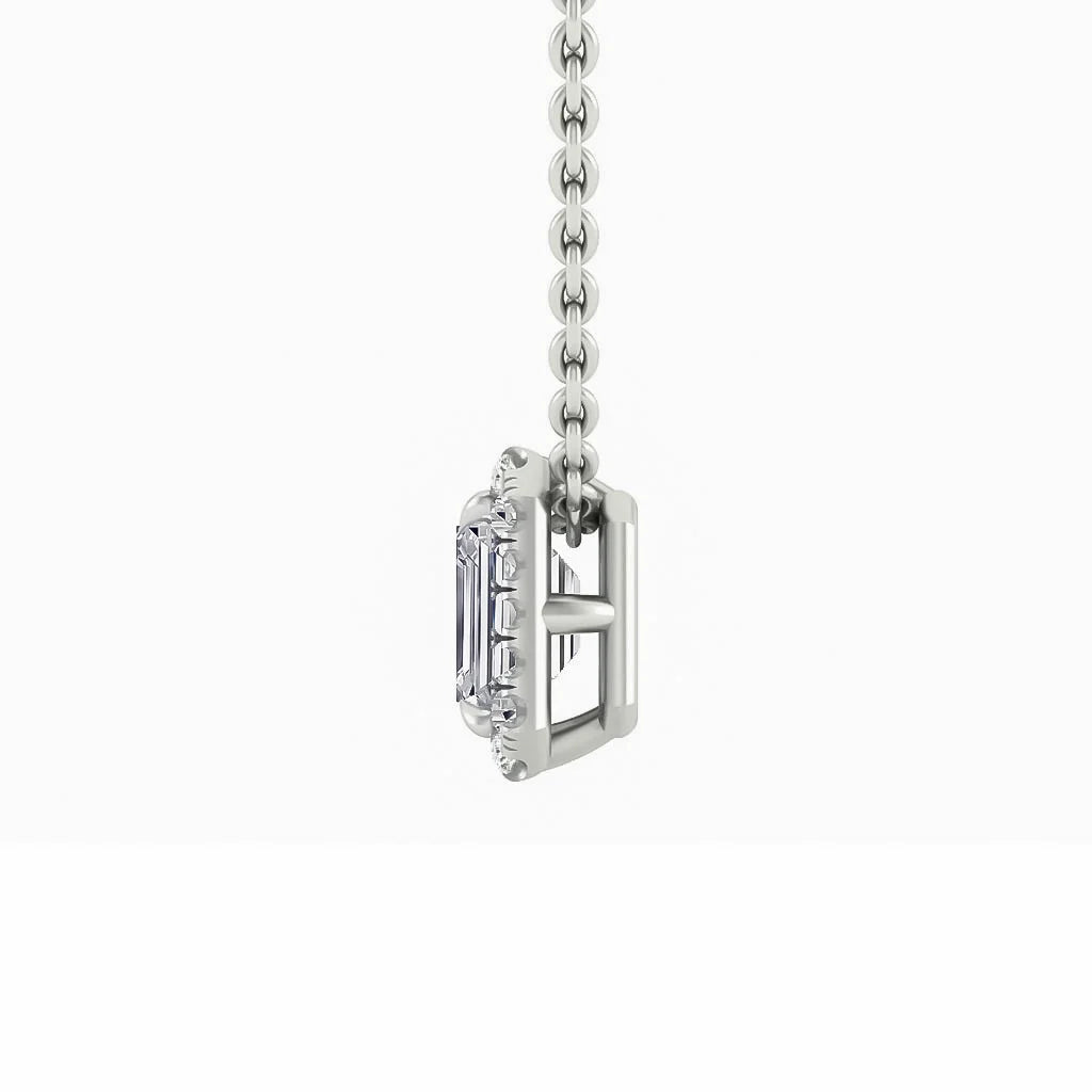 Side view of a silver chain necklace with a rectangular gemstone pendant in a prong setting.