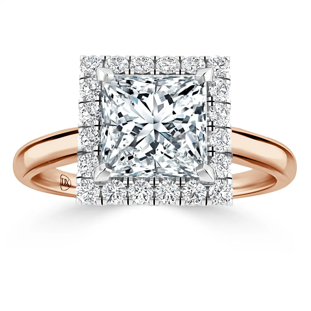 Rose gold ring with a large square diamond center, surrounded by two rows of small round diamonds.