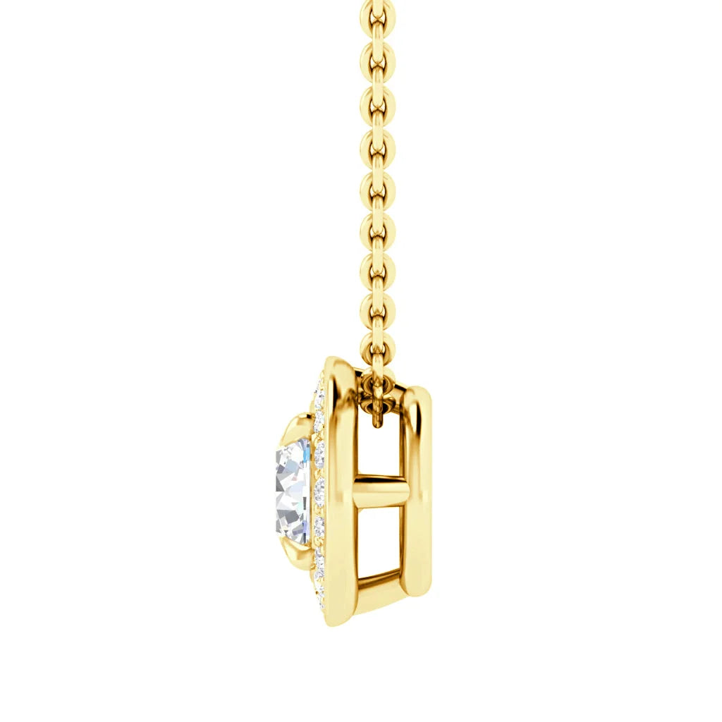 Gold necklace with an H pendant, encrusted with small diamonds and a larger central gem, side view.