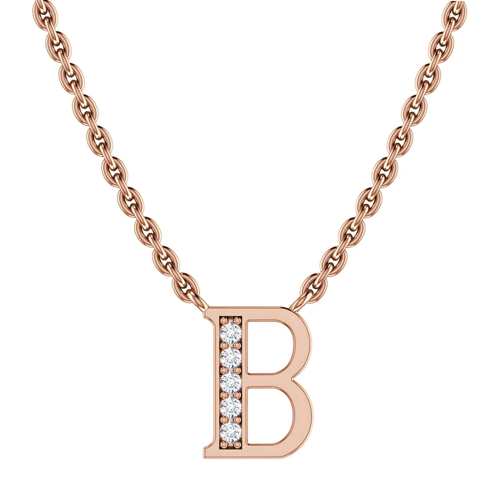 Gold chain necklace with a capital letter B pendant, accented with small clear gemstones on the left side.