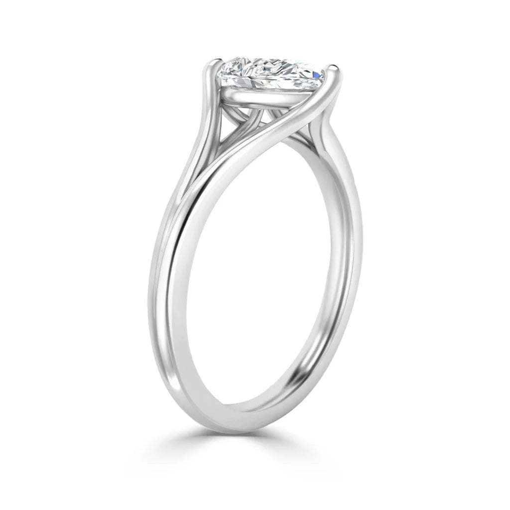 A solitaire oval diamond engagement ring with a twisted white gold band, shown from the side.