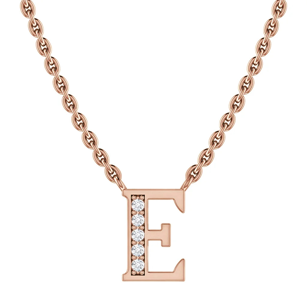 Rose gold chain necklace with a pendant shaped like the letter E, partly adorned with small white gemstones.