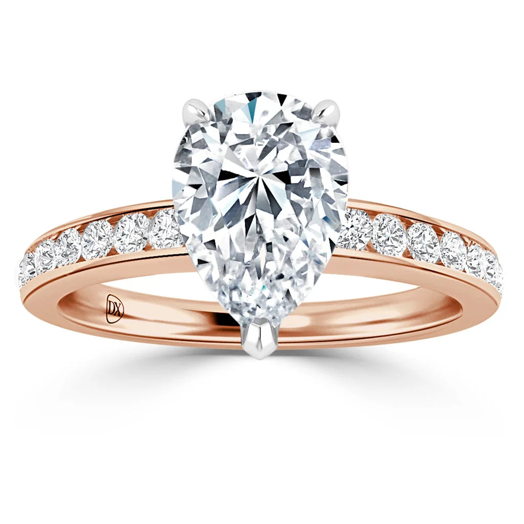 Pear-shaped diamond ring with rose gold band, accented by small round diamonds along the band.