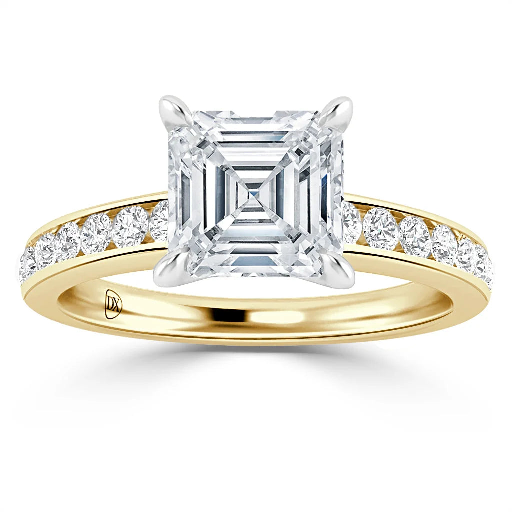 Gold ring with an Asscher-cut diamond center and round diamonds along the band, seen from the front.