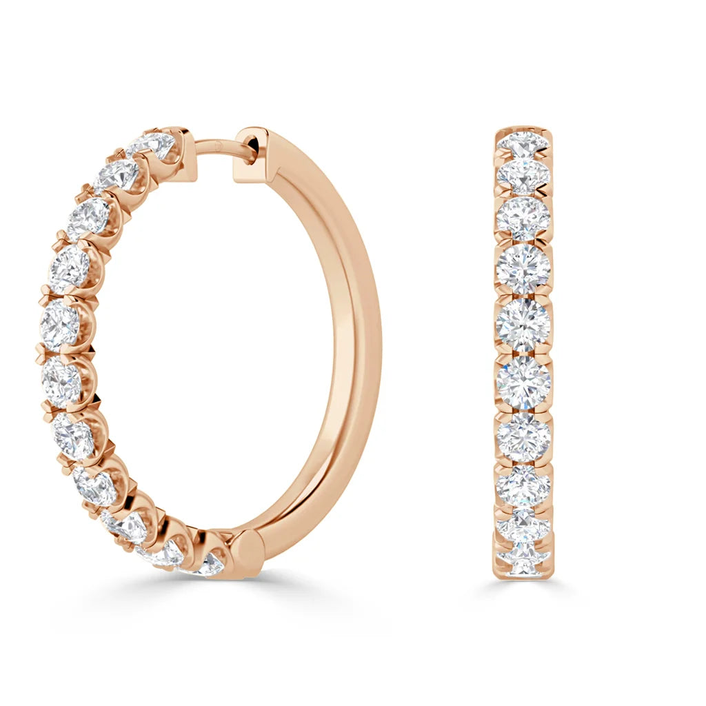 Rose gold hoop earrings encrusted with round white diamonds, shown both front and side views against white.