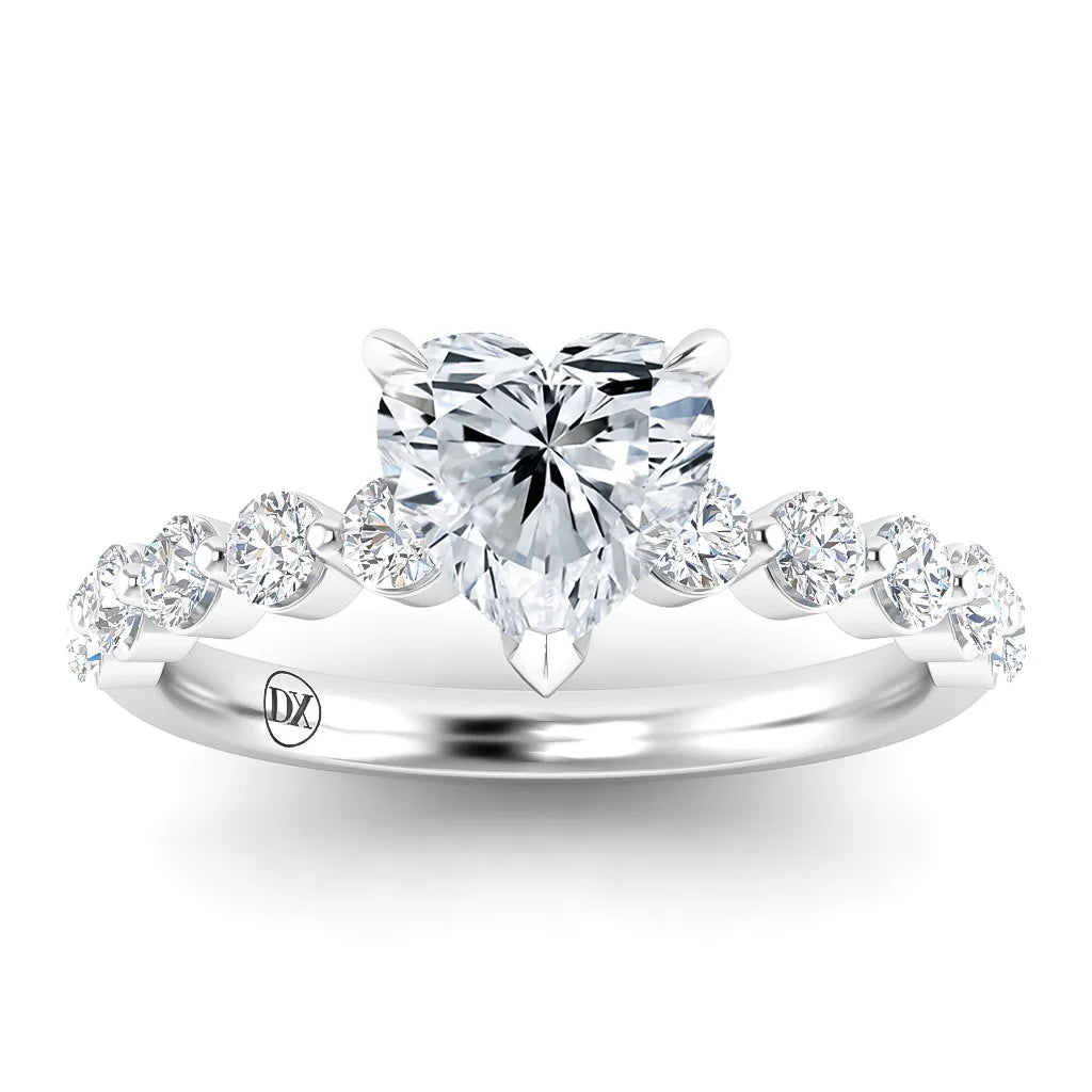Heart-shaped diamond ring with round diamonds on a silver band, viewed from the front.