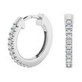 A pair of silver hoop earrings, each adorned with a row of small round white gemstones on the front.