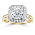 A gold ring with a square diamond center, halo of smaller diamonds, and diamonds along the band.
