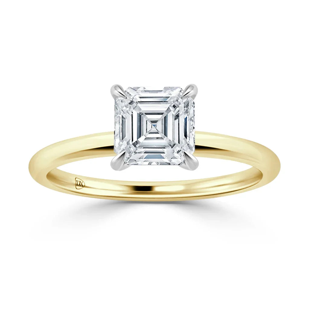 A gold ring with an asscher-cut diamond solitaire set in a simple, elegant setting on a white background.