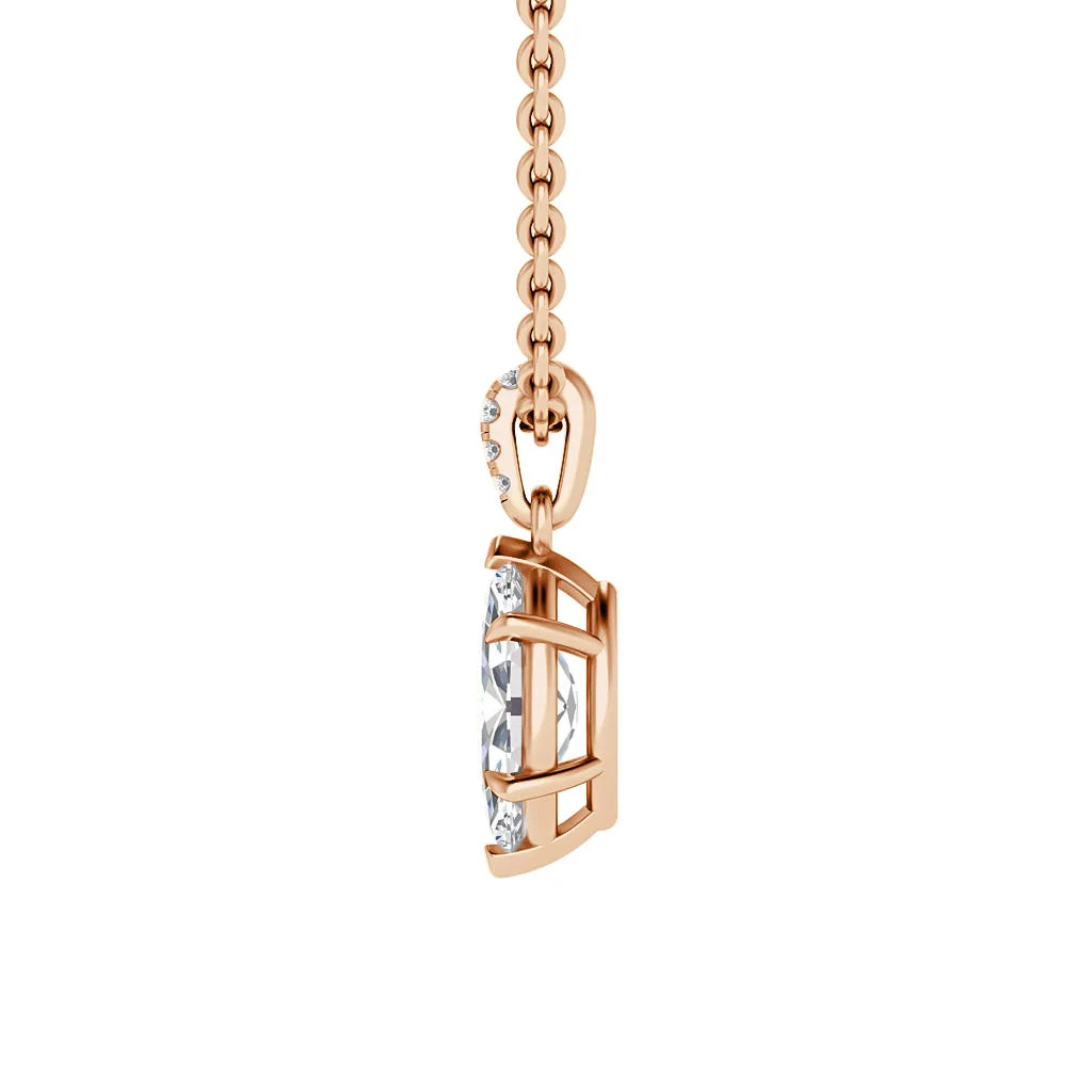 Rose gold necklace with a geometric pendant holding a clear gemstone, shown from the side on a white background.