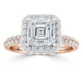 Rose gold ring with a large square-cut diamond, surrounded by a halo of smaller diamonds on the band.