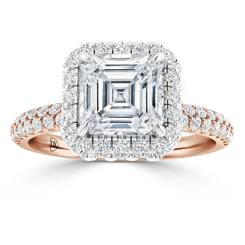 Rose gold ring with a large square-cut diamond, surrounded by a halo of smaller diamonds on the band.