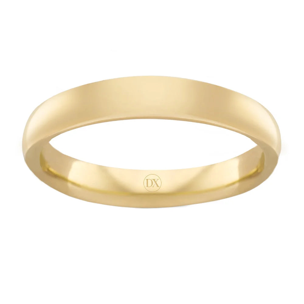 Simple gold wedding band with a smooth, polished finish and a small DX engraved inside the ring.