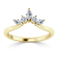 Gold ring with three marquise and two round diamonds arranged in a crown-like cluster setting.