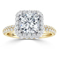 Gold ring with a large square diamond, double halo of smaller diamonds, and diamond accents on the band.
