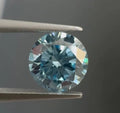 0.68ct Round Natural Diamond (Colour Fancy Intense Blue, Clarity VVS1, Cut EX, IGI Certified)