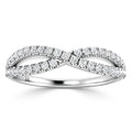 A silver infinity-shaped ring with two rows of small, round diamonds set along the twisted band.