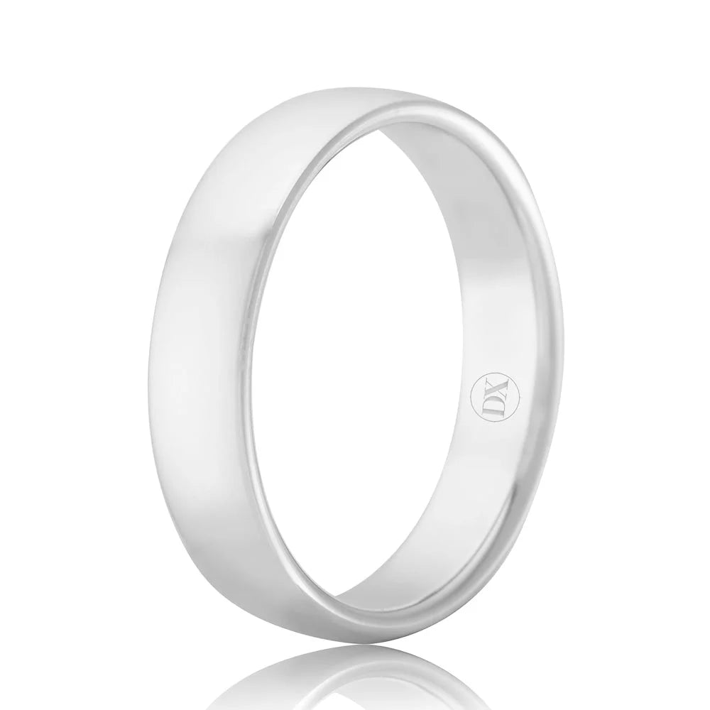 A plain, polished silver ring with a smooth surface and a small engraved symbol on the inner band.