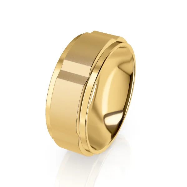 A wide, polished yellow gold ring with a beveled edge, shown against a plain white background.