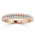 Rose gold ring with two rows of small round diamonds set along the top half of the band.