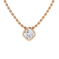 A rose gold chain necklace with a square diamond pendant set in a rose gold bezel.