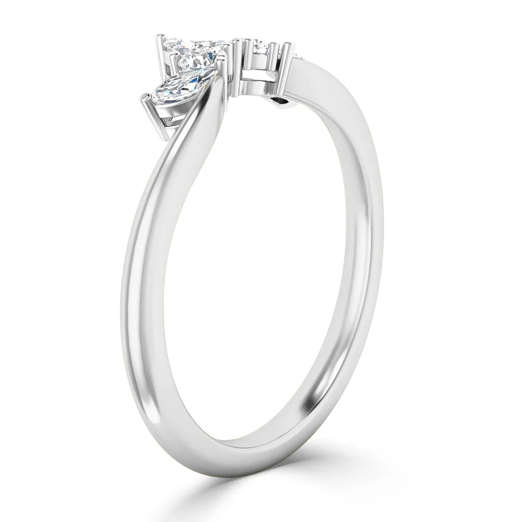 A white gold ring with a twisting band featuring three prong-set diamonds in a modern, elegant setting.