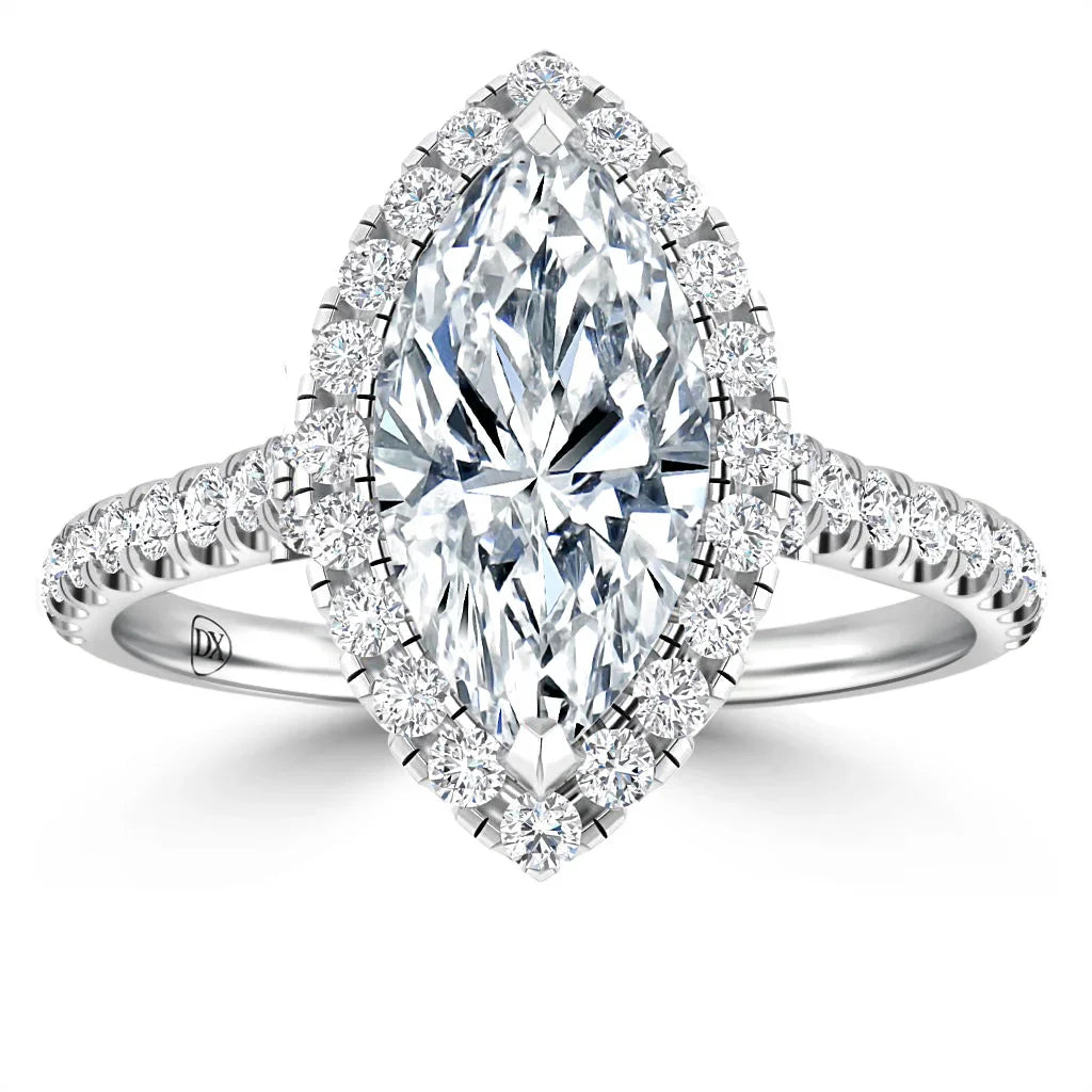 Marquise-cut diamond ring with a halo of smaller diamonds on a diamond-studded white gold band, on white background.