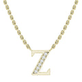 Gold chain necklace with a letter Z pendant, partly decorated with small sparkling white gemstones.