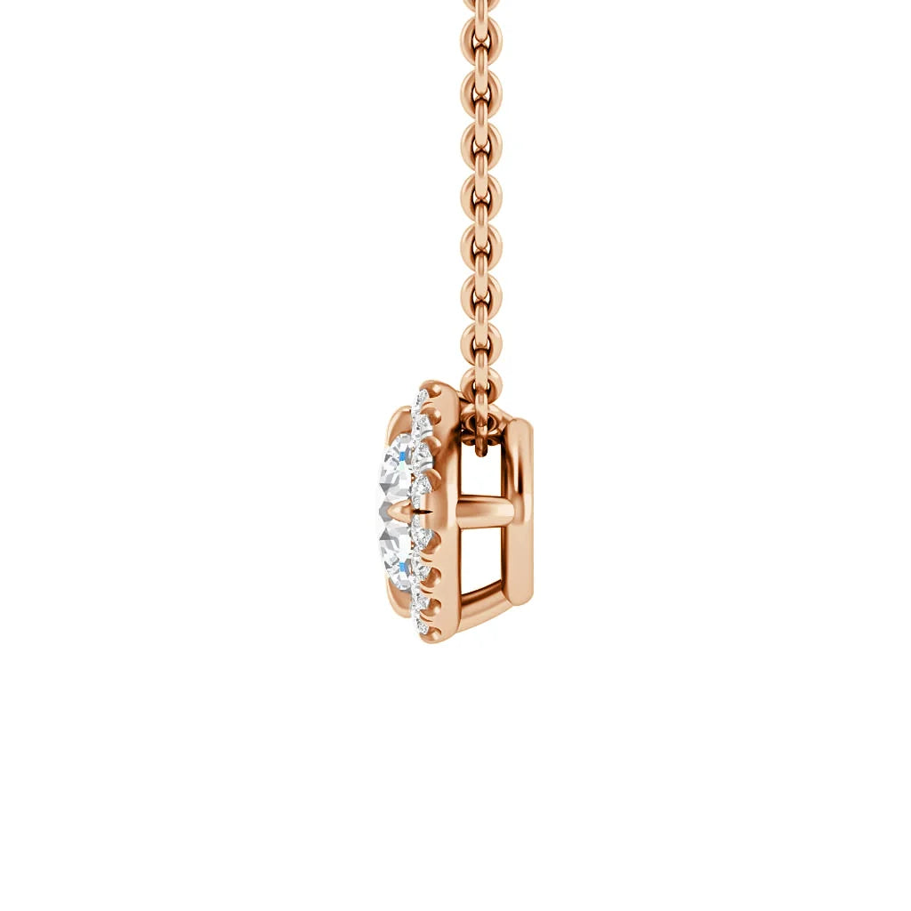 A rose gold necklace with a pendant featuring a vertical row of sparkling round white diamonds.