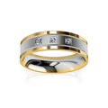 Gold and silver band ring with three small diamonds set in a row on the silver center.