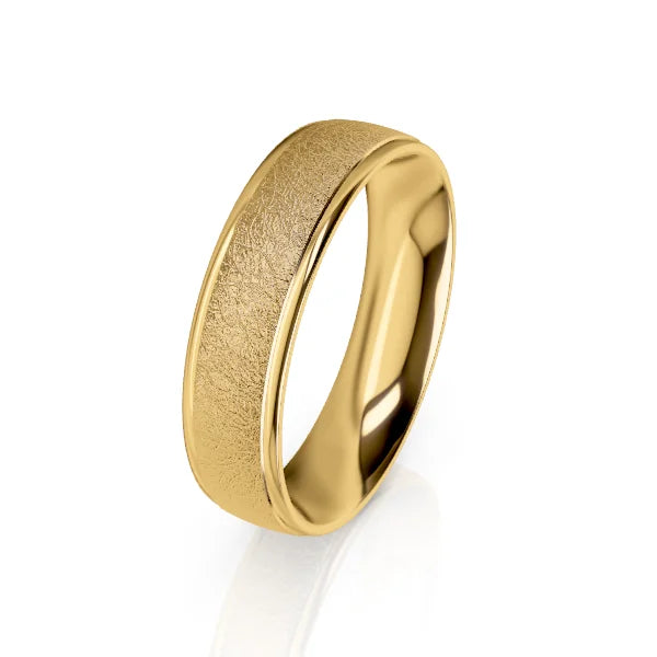 Yellow gold ring with a matte textured center band and polished edges, set against a white background.