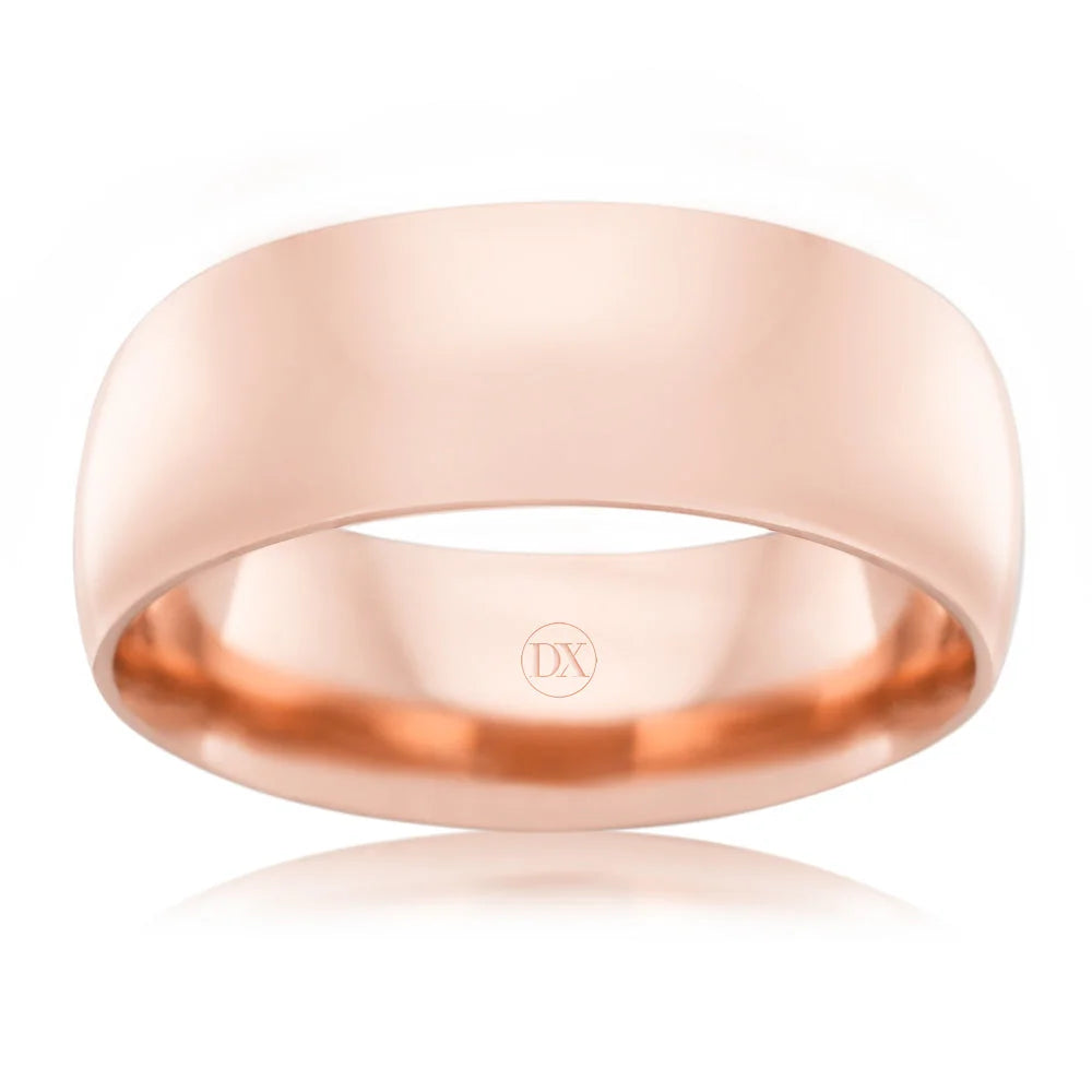 A polished rose gold wedding band with a simple, smooth finish is shown on a white background.