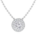 A silver necklace with a round diamond pendant surrounded by a halo of smaller diamonds.