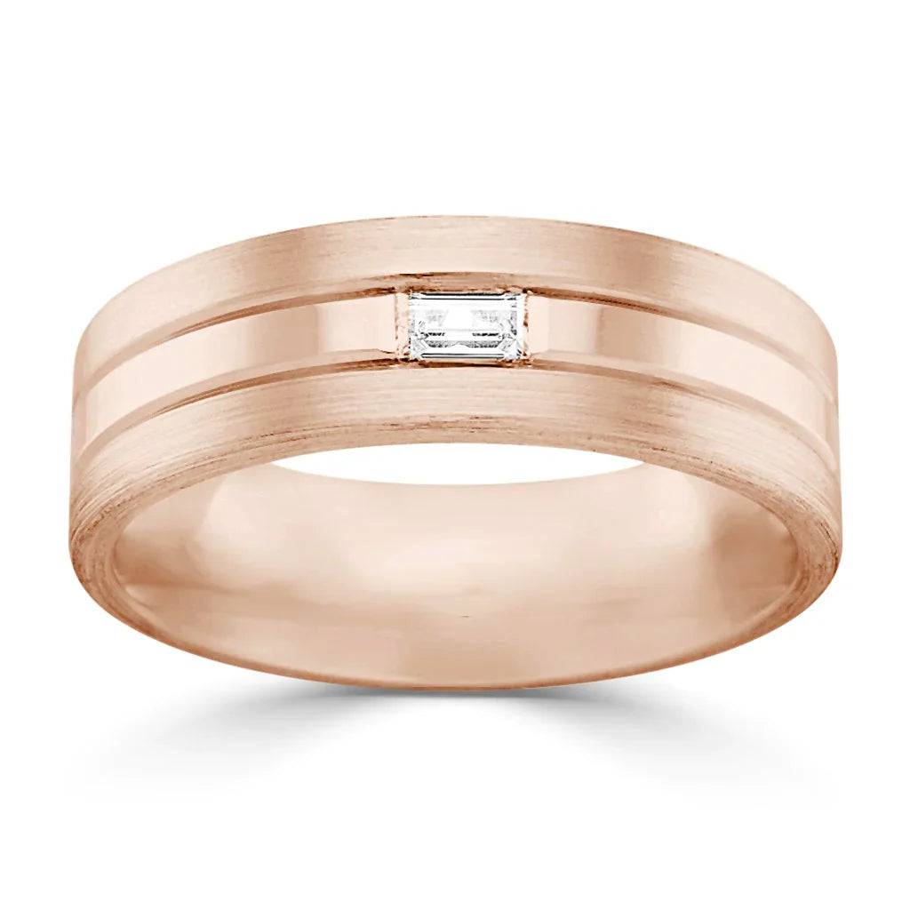 Rose gold ring with a matte finish, featuring a single rectangular diamond set in the center.