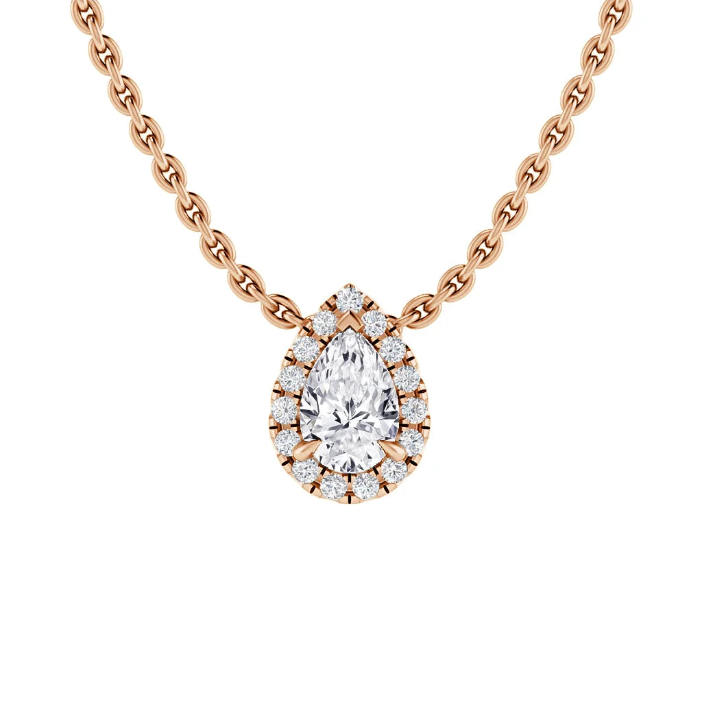Rose gold chain necklace with a pear-shaped diamond pendant surrounded by a halo of smaller diamonds.