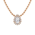 Rose gold chain necklace with a pear-shaped diamond pendant surrounded by a halo of smaller diamonds.