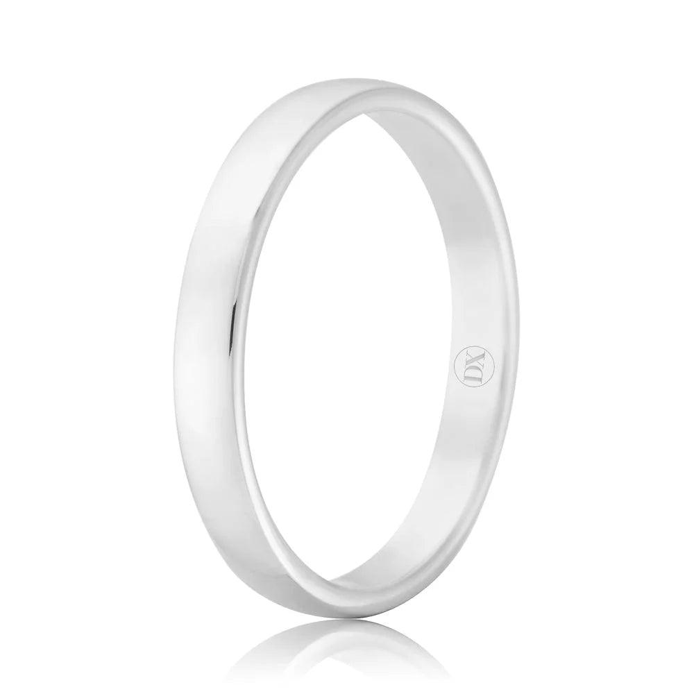 A simple, polished silver ring with a smooth surface and a small engraved logo on the inside band.