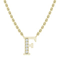 Gold chain necklace with a letter F pendant, accented by a vertical row of sparkling diamonds.