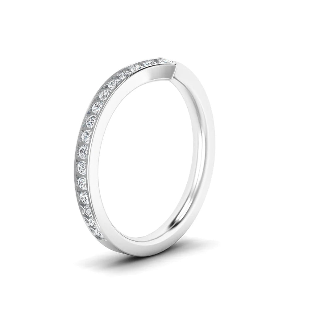 A thin silver ring with small round diamonds set halfway around the band, shown on a white background.