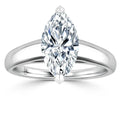 Marquise-cut diamond solitaire ring with a simple, polished white metal band, viewed from the front.