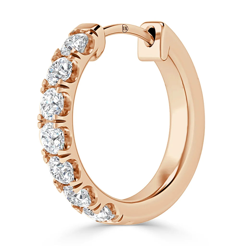 Rose gold hoop earring adorned with a row of round, sparkling white diamonds set along the front edge.