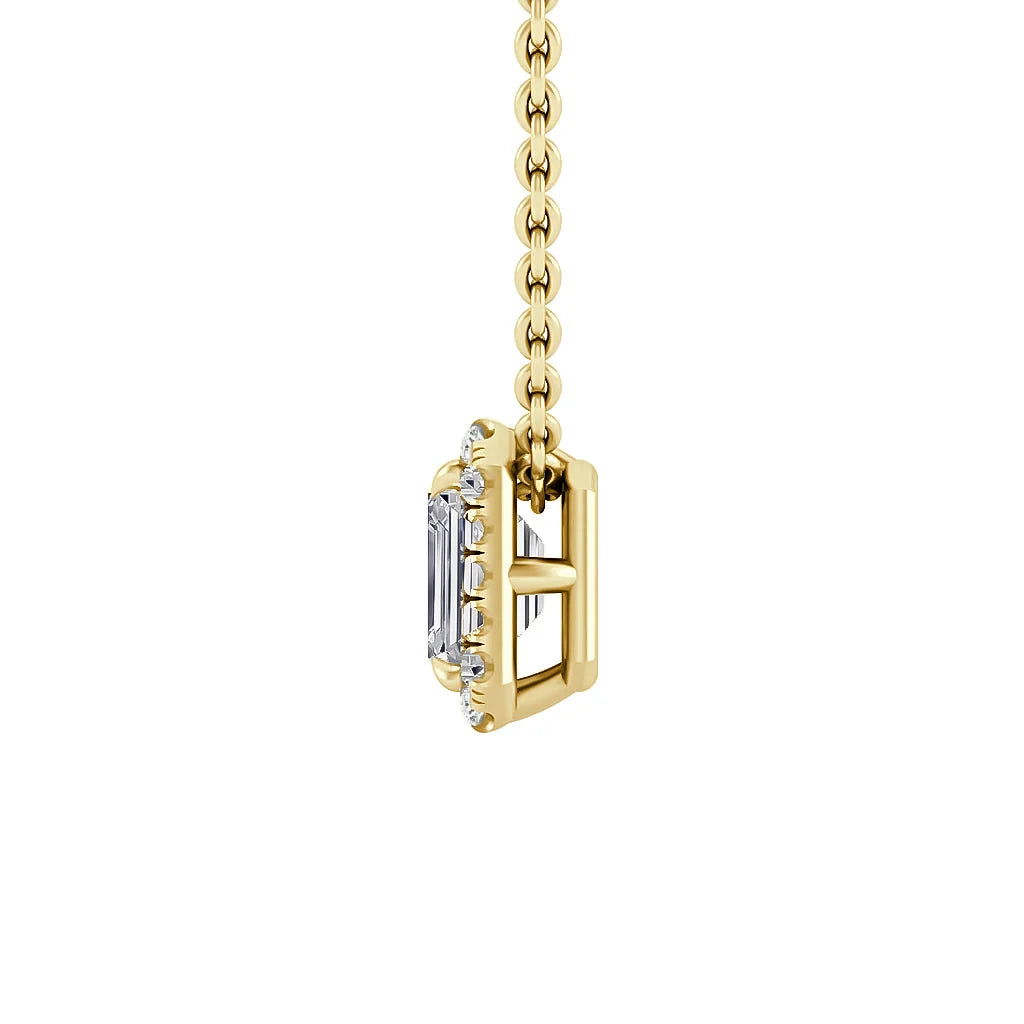 A gold chain holds a rectangular, vertically-set diamond pendant viewed from the side on a white background.